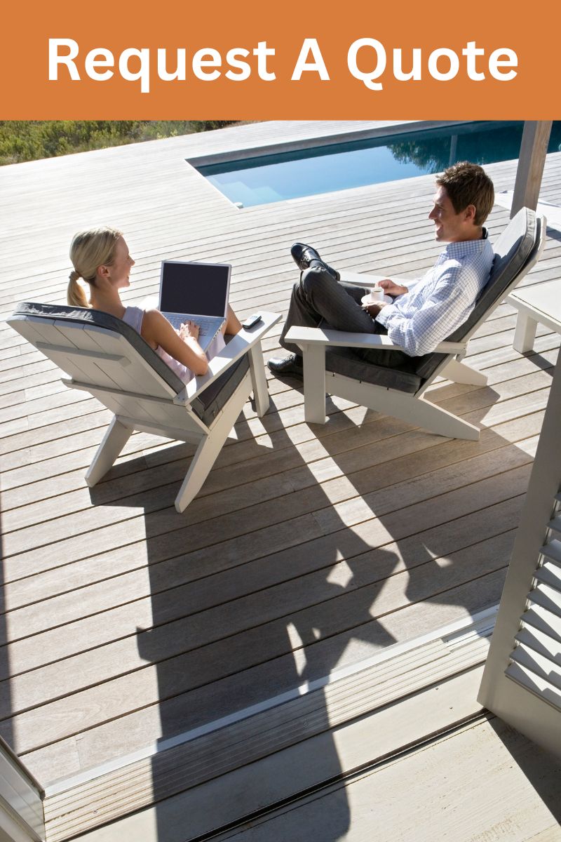 couple talking in pool decks with laptop