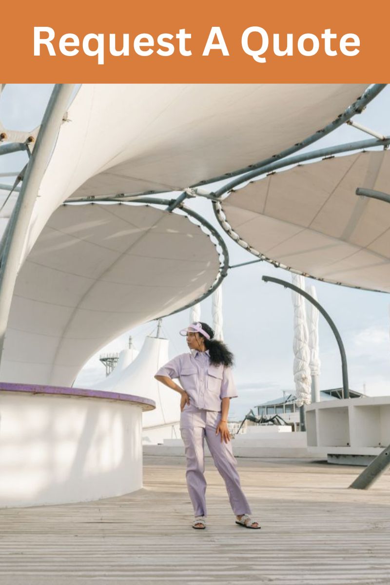 woman standing on walkway of the shade structure