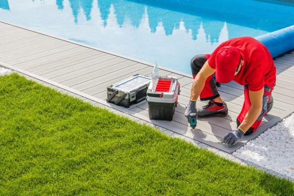 pool deck contractor installing composite deck