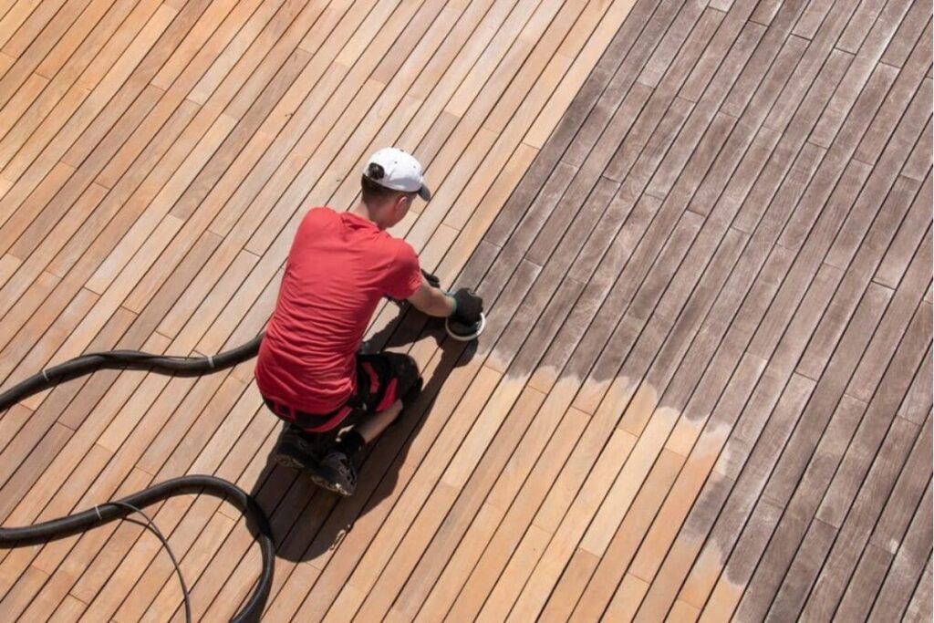 a professional contractors working on deck for restoration