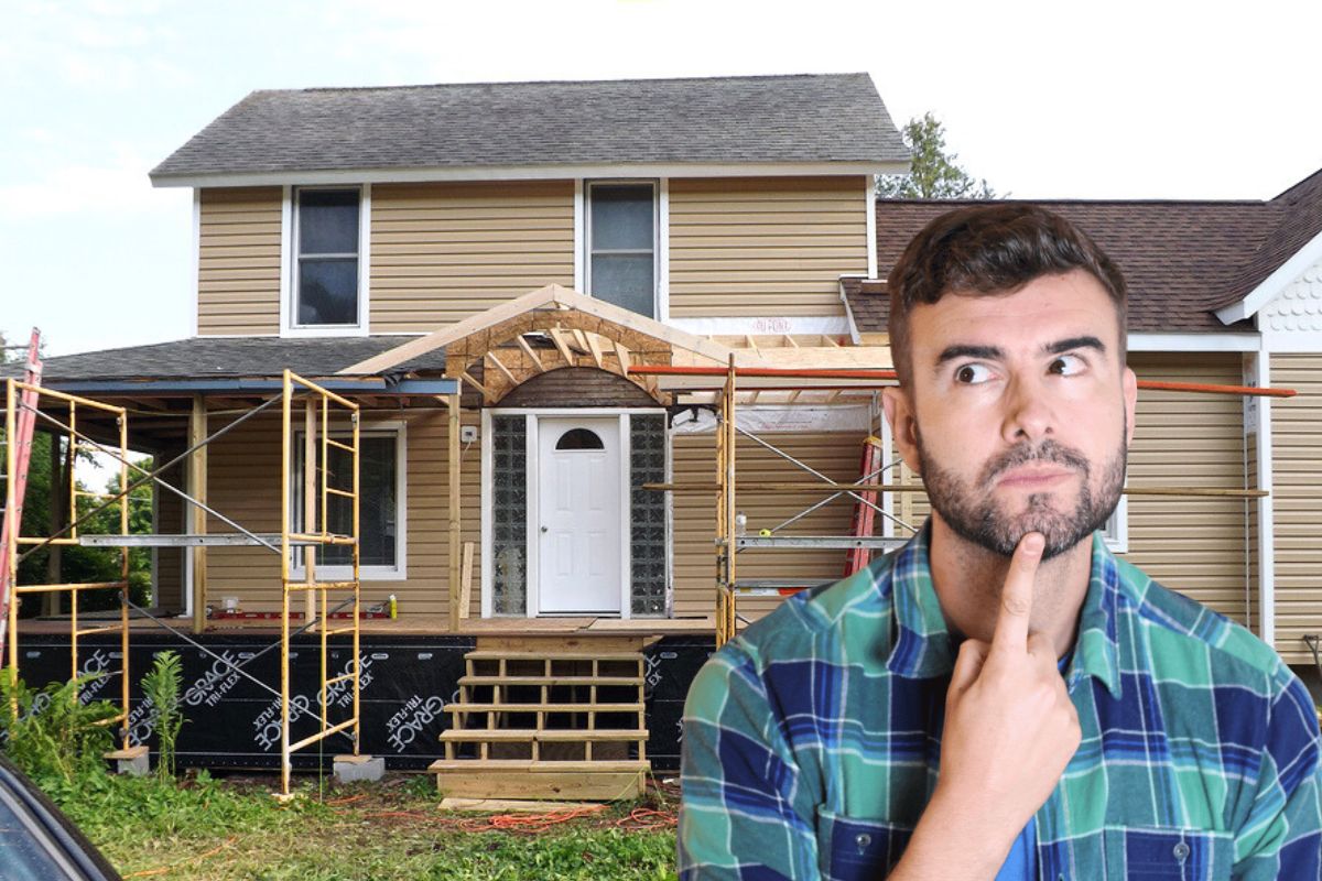 man thinking how to add a porch on their home in knoxville, tn